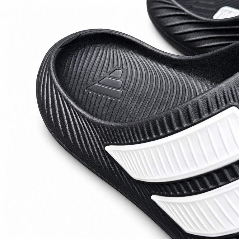 Black and white Adidas Purechill slides, view 2