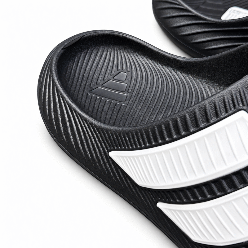 Black and white Adidas Purechill slides, view 2