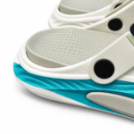 White and green clogs footbed and turquoise sole close-up