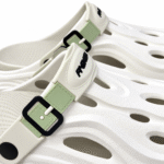 White and green clogs buckle and ventilation detail